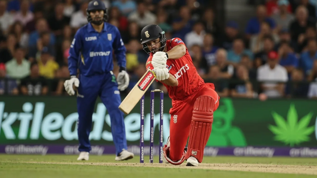 Tight sideline frame of a Hundred seam-bowling all-rounder driving through the leg side at the Rose Bowl, captured at 200mm with shallow depth of field and the crowd blurred behind the rope